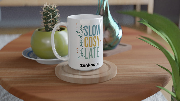 Proudly Slow Cosy Late 15oz mug on a wooden table with a cactus, Zen Koala Australia