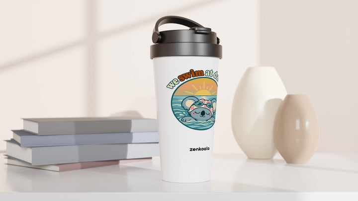 We Swim at Dawn travel mug beside books and vases, Zen Koala Australia