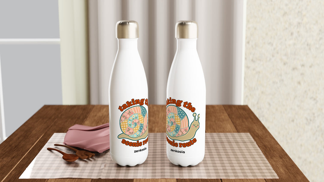 Two Taking the Scenic Route Snail water bottles on a table, Zen Koala Australia