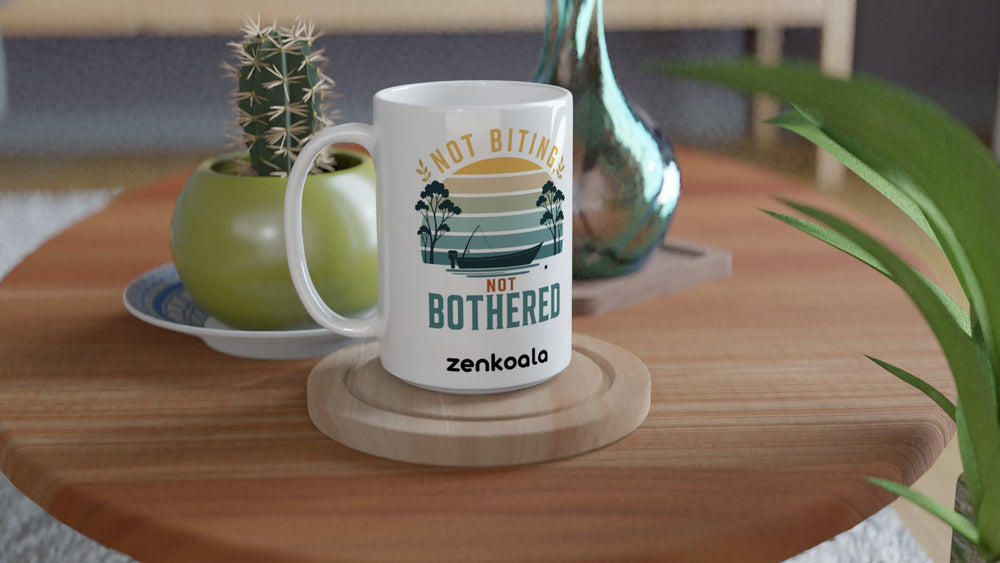 Not Biting Not Bothered 15oz mug on a wooden table with a cactus, Zen Koala Australia