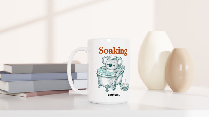 Soaking Koala Bath 15oz mug beside books and vases, Zen Koala Australia