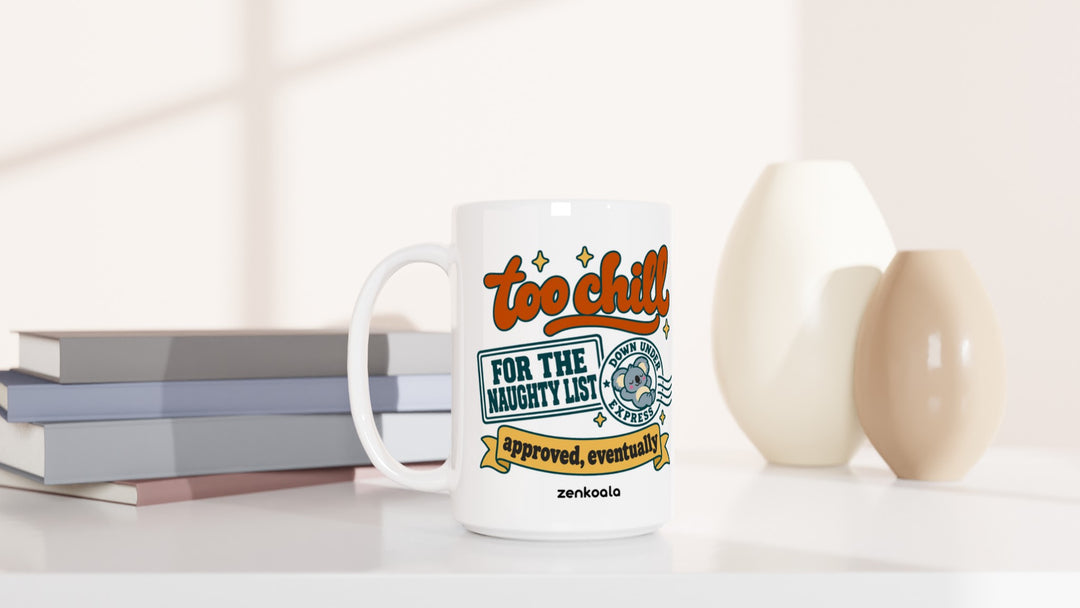 Too Chill for the Naughty List 15oz mug beside books and vases, Zen Koala Australia
