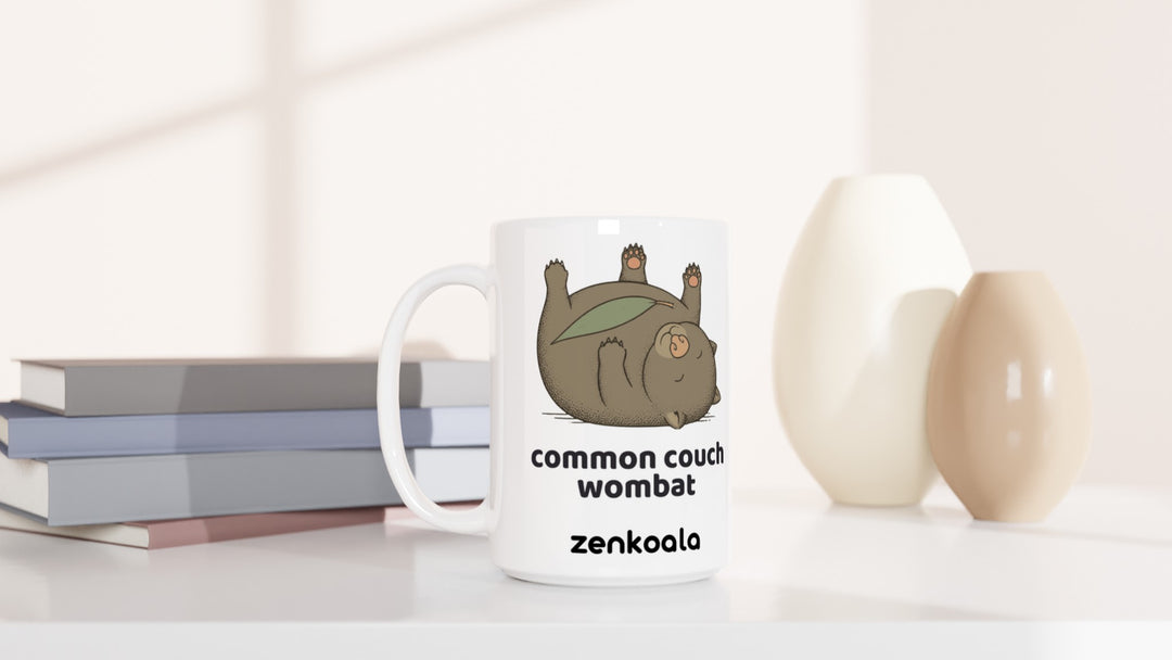 Common Couch Wombat 15oz mug beside books and vases, Zen Koala Australia
