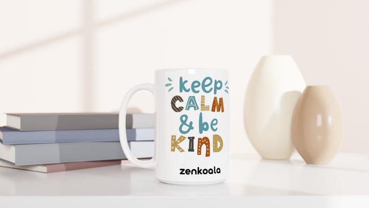 Keep Calm, Be Kind 15oz mug beside books and vases, Zen Koala Australia