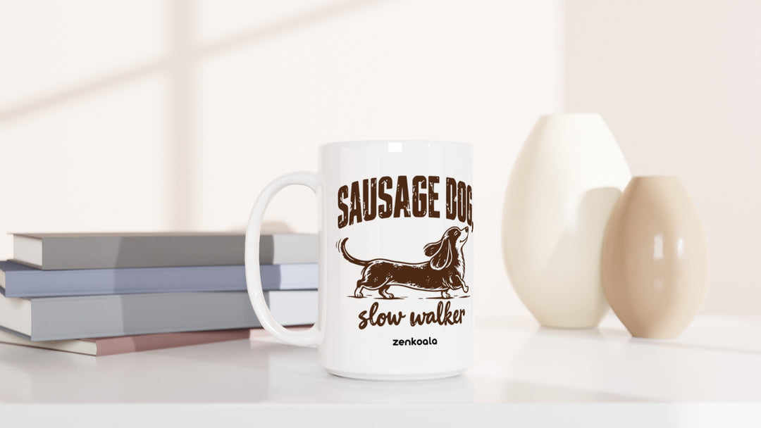 Sausage Dog Slow Walker 15oz mug beside books and vases, Zen Koala Australia