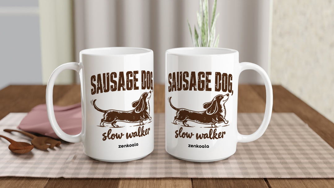 Two Sausage Dog Slow Walker 15oz mugs on a table, showing both sides of the design, Zen Koala Australia
