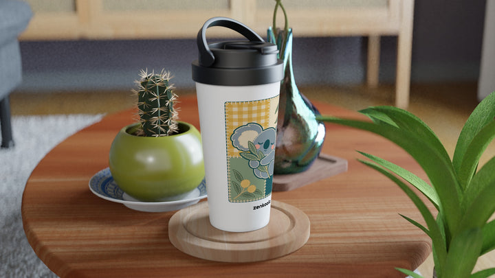 Koala Quilt travel mug on a wooden table with a cactus, Zen Koala Australia