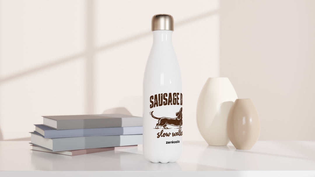 Sausage Dog Slow Walker water bottle beside books and vases, Zen Koala Australia