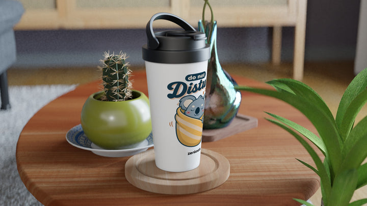 Do Not Disturb Koala travel mug on a wooden table with a cactus, Zen Koala Australia