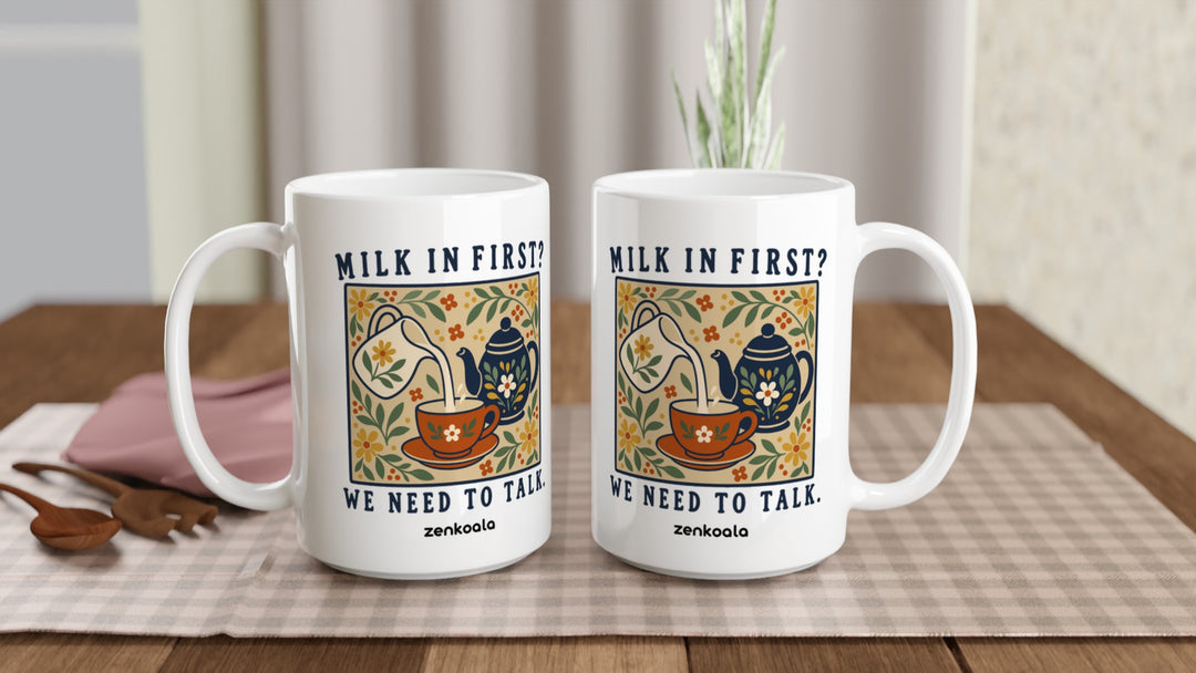 Two Milk in First 15oz mugs on a table, showing both sides of the design, Zen Koala Australia