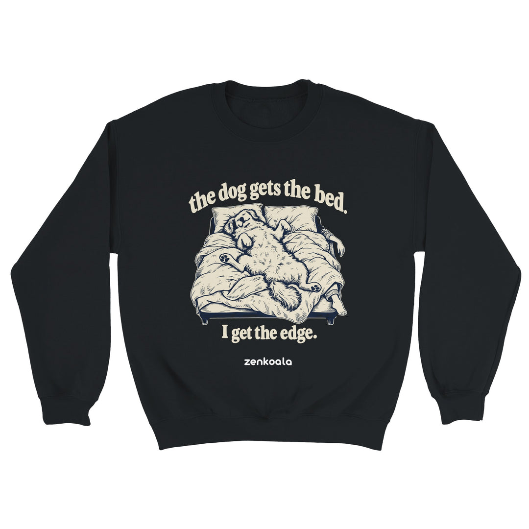 The Dog Gets the Bed feel-good sweatshirt in black: a dog sprawled across the whole bed, Zen Koala Australia