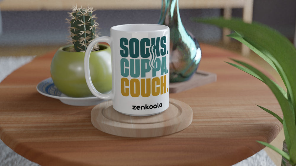 Socks Cuppa Couch 15oz mug on a wooden table with a cactus, Zen Koala Australia