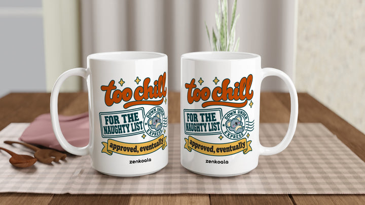 Two Too Chill for the Naughty List 15oz mugs on a table, showing both sides of the design, Zen Koala Australia