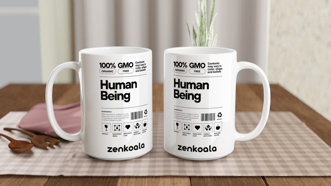 Two Human Being 15oz mugs on a table, showing both sides of the design, Zen Koala Australia
