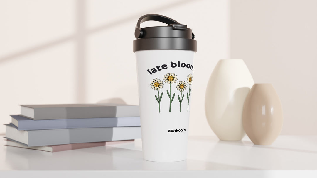 Late Bloomer travel mug beside books and vases, Zen Koala Australia