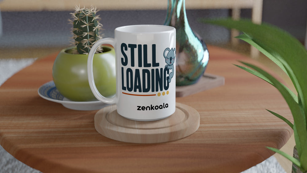 Still Loading Koala 15oz mug on a wooden table with a cactus, Zen Koala Australia