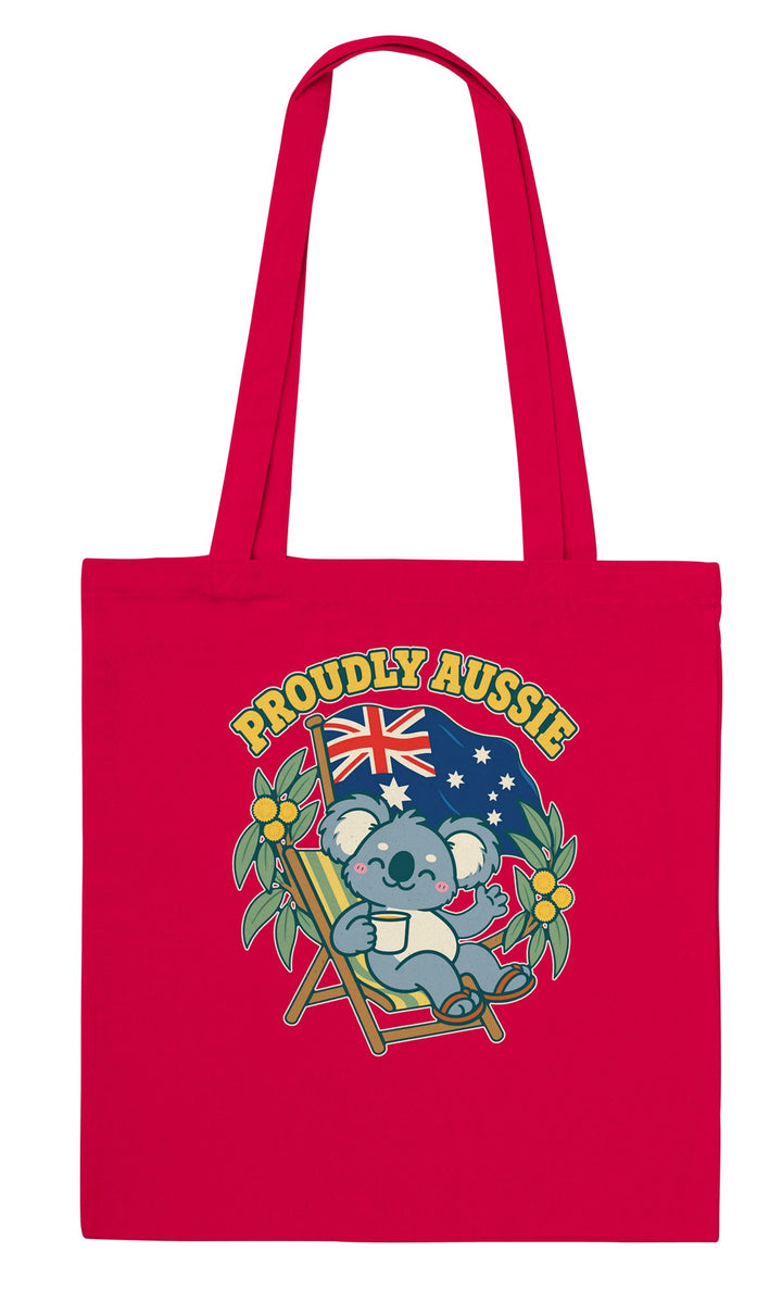 Proudly Aussie feel-good tote bag in red: a koala in a beach chair under the Australian flag, Zen Koala Australia