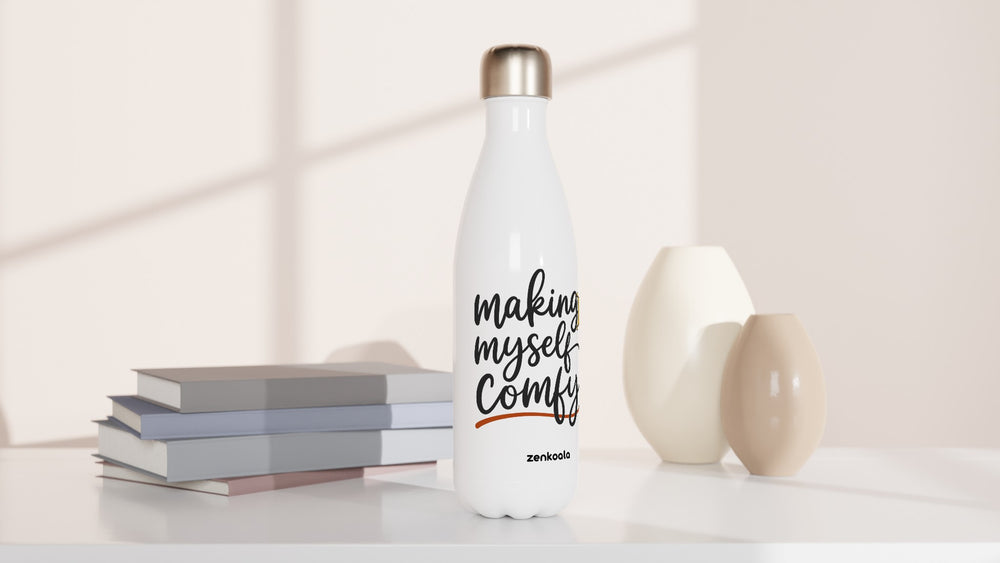 Making Myself Comfy water bottle beside books and vases, Zen Koala Australia