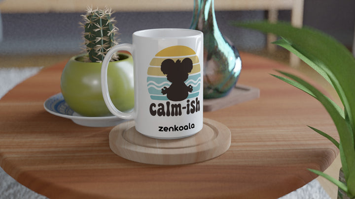 Calm-ish Retro Sunset Koala 15oz mug on a wooden table with a cactus, Zen Koala Australia