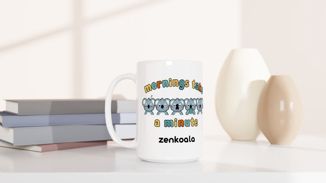 Mornings Take a Minute 15oz mug beside books and vases, Zen Koala Australia