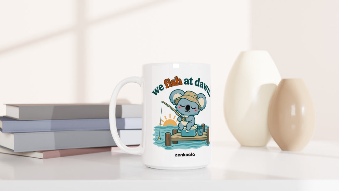 We Fish at Dawn 15oz mug beside books and vases, Zen Koala Australia