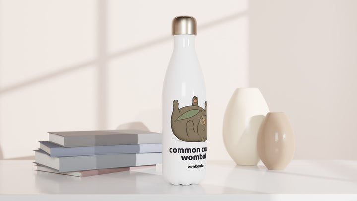 Common Couch Wombat water bottle beside books and vases, Zen Koala Australia