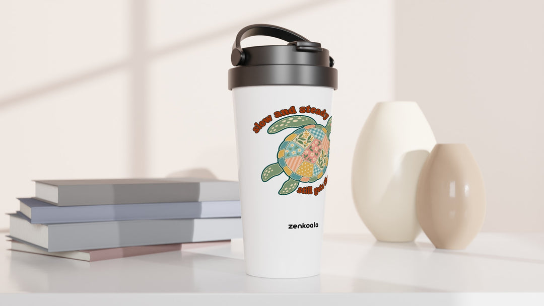 Slow and Steady Turtle travel mug beside books and vases, Zen Koala Australia