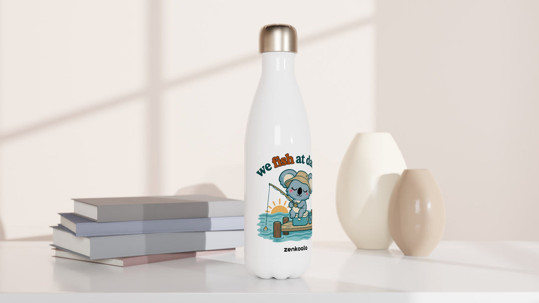 We Fish at Dawn water bottle beside books and vases, Zen Koala Australia