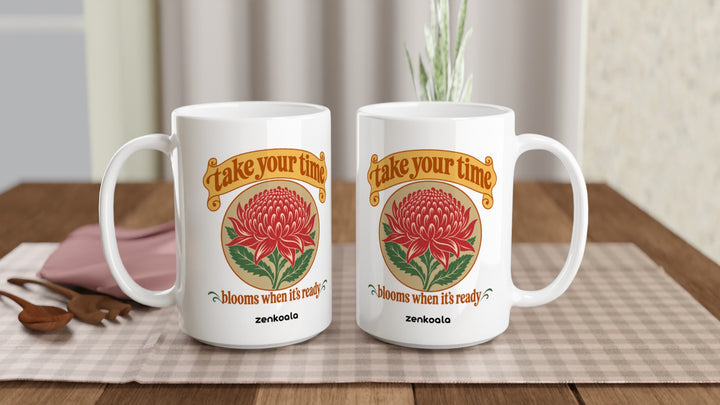Two Take Your Time 15oz mugs on a table, showing both sides of the design, Zen Koala Australia
