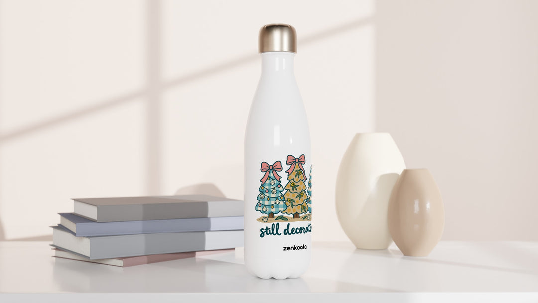 Still Decorating water bottle beside books and vases, Zen Koala Australia