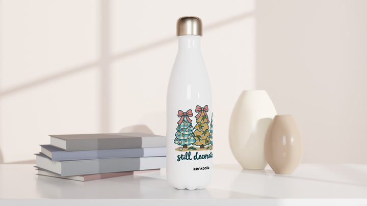 Still Decorating water bottle beside books and vases, Zen Koala Australia