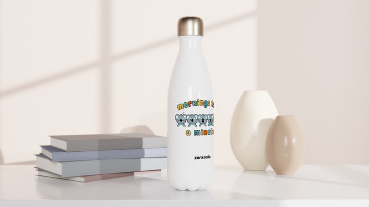 Mornings Take a Minute water bottle beside books and vases, Zen Koala Australia