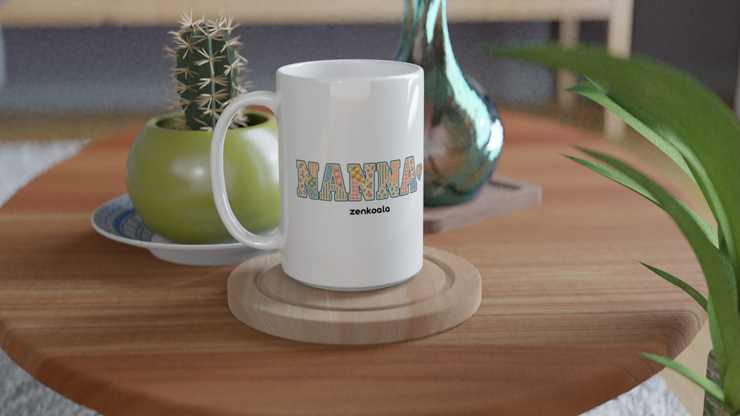 Nanna Faux Patchwork 15oz mug on a wooden table with a cactus, Zen Koala Australia