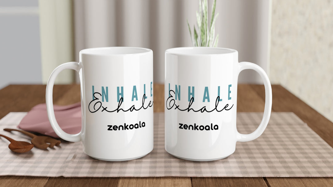 Two Exhale 15oz mugs on a table, showing both sides of the design, Zen Koala Australia