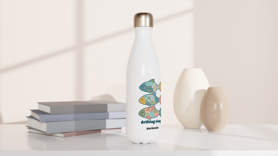 Drifting Along Fish water bottle beside books and vases, Zen Koala Australia