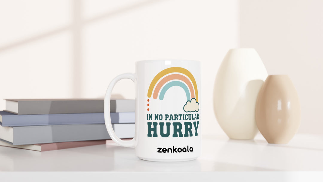 In No Particular Hurry 15oz mug beside books and vases, Zen Koala Australia