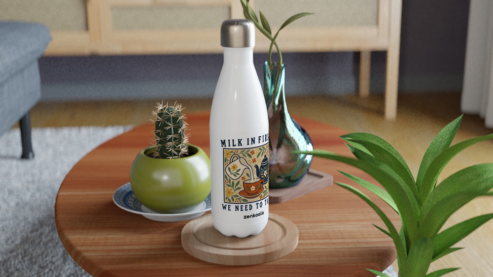 Milk in First water bottle on a wooden table with a cactus, Zen Koala Australia