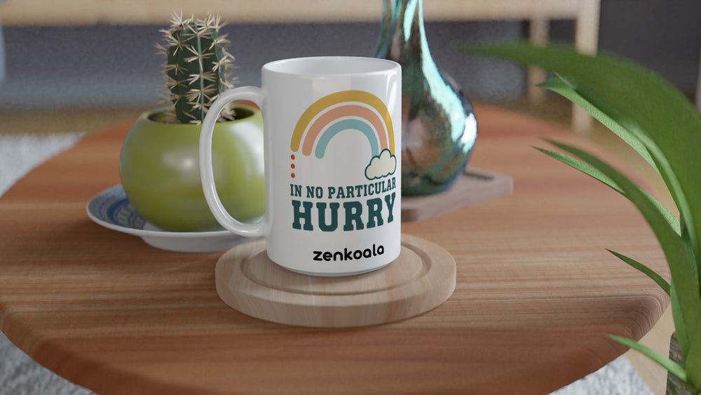 In No Particular Hurry 15oz mug on a wooden table with a cactus, Zen Koala Australia