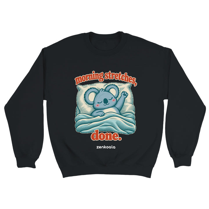 Morning Stretches Done feel-good sweatshirt in black: a koala in bed giving one big stretch, Zen Koala Australia