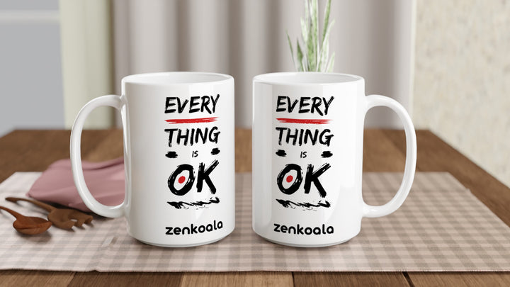Two Everything is OK 15oz mugs on a table, showing both sides of the design, Zen Koala Australia