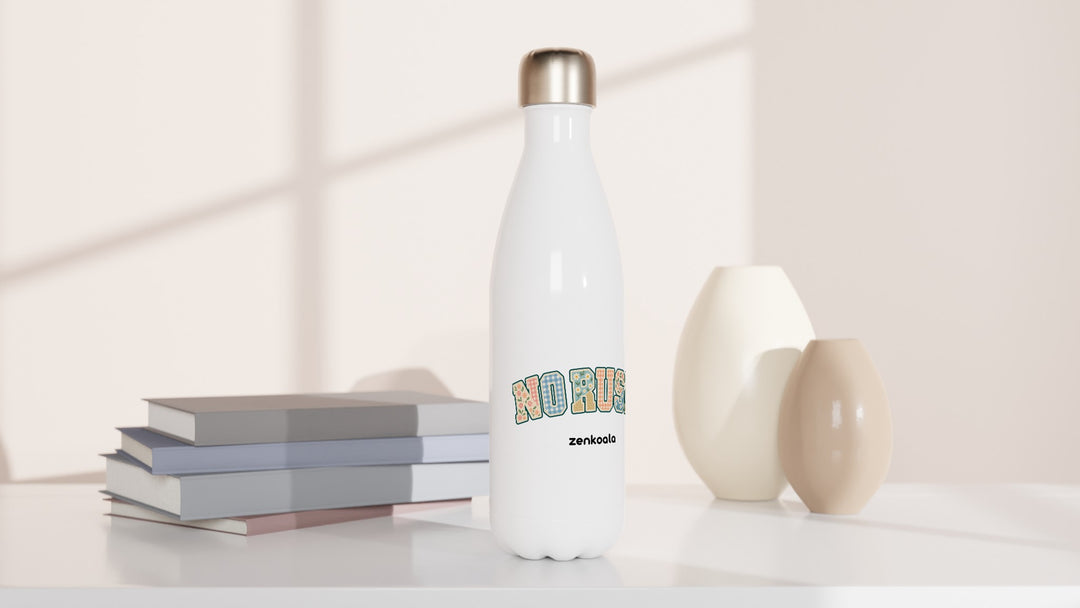 No Rush Faux Patchwork water bottle beside books and vases, Zen Koala Australia