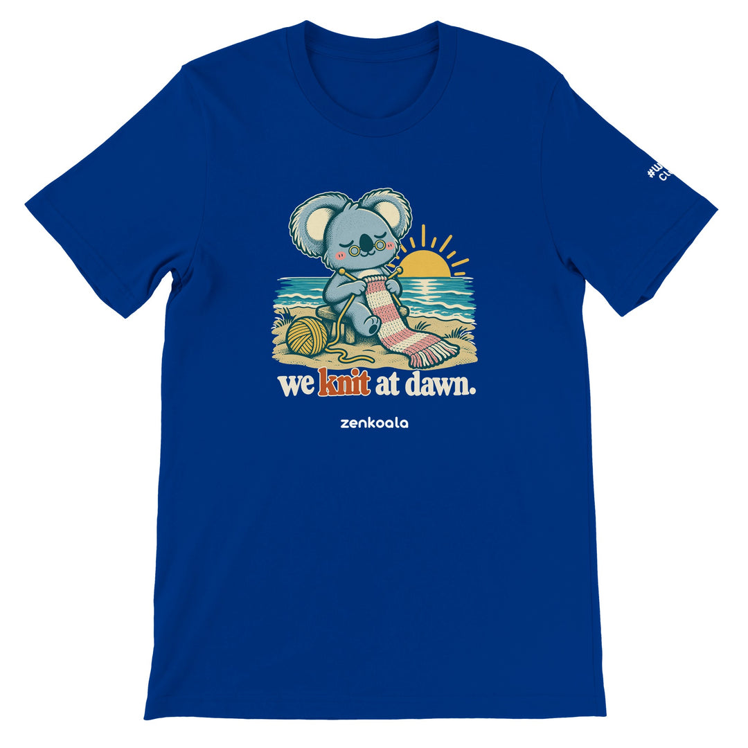 We Knit at Dawn feel-good tee in true royal: a koala knitting on the beach, Zen Koala Australia