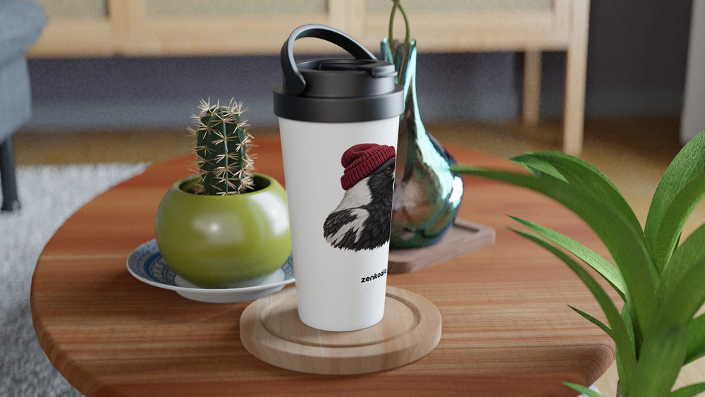 Magpie Beanie travel mug on a wooden table with a cactus, Zen Koala Australia