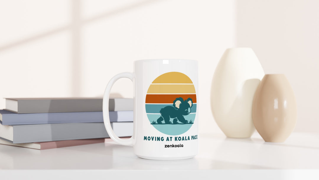Moving at Koala Pace 15oz mug beside books and vases, Zen Koala Australia