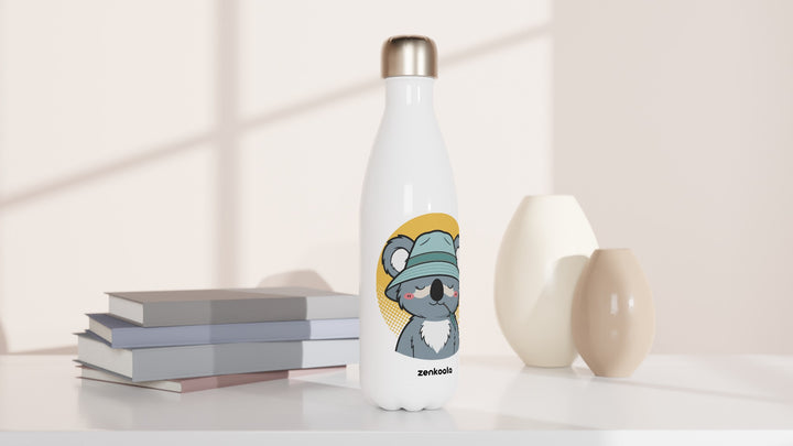 Koala Zinc and Bucket Hat water bottle beside books and vases, Zen Koala Australia