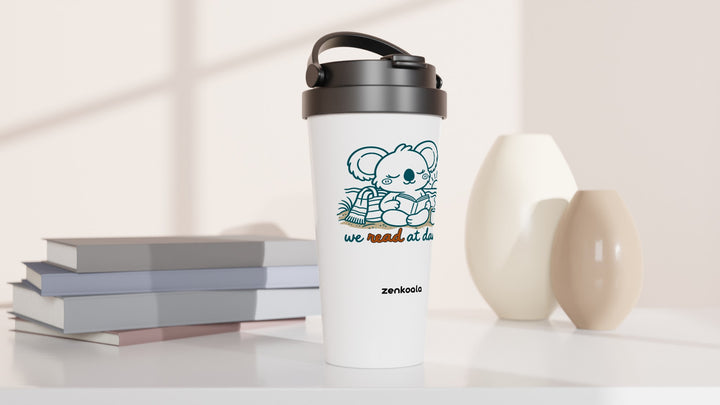 We Read at Dawn travel mug beside books and vases, Zen Koala Australia