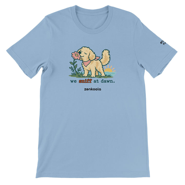 We Sniff at Dawn feel-good tee in light blue: a golden retriever sniffing a flower, Zen Koala Australia