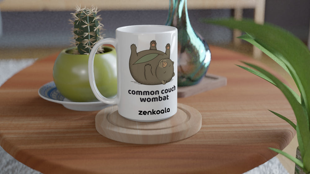 Common Couch Wombat 15oz mug on a wooden table with a cactus, Zen Koala Australia