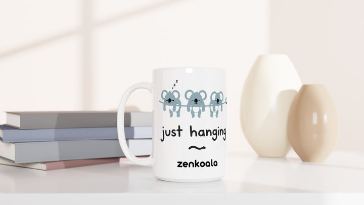 Just Hanging 15oz mug beside books and vases, Zen Koala Australia