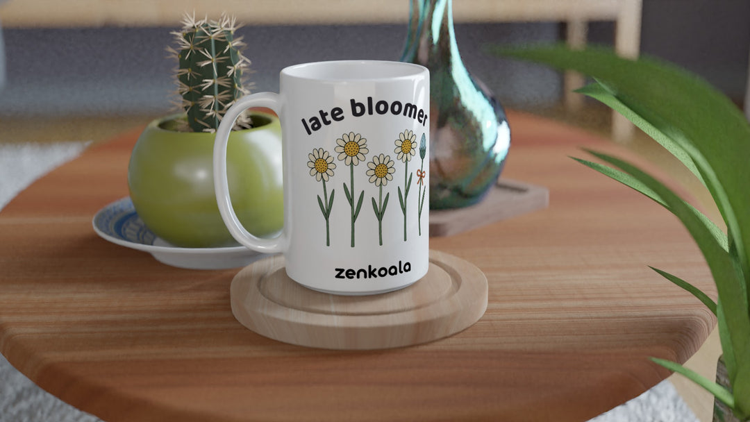 Late Bloomer 15oz mug on a wooden table with a cactus, Zen Koala Australia